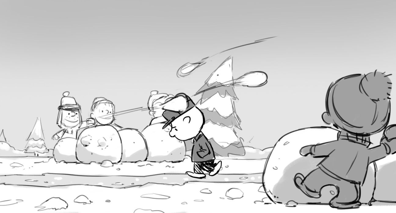 a boy walking through the middle of a snowball fight