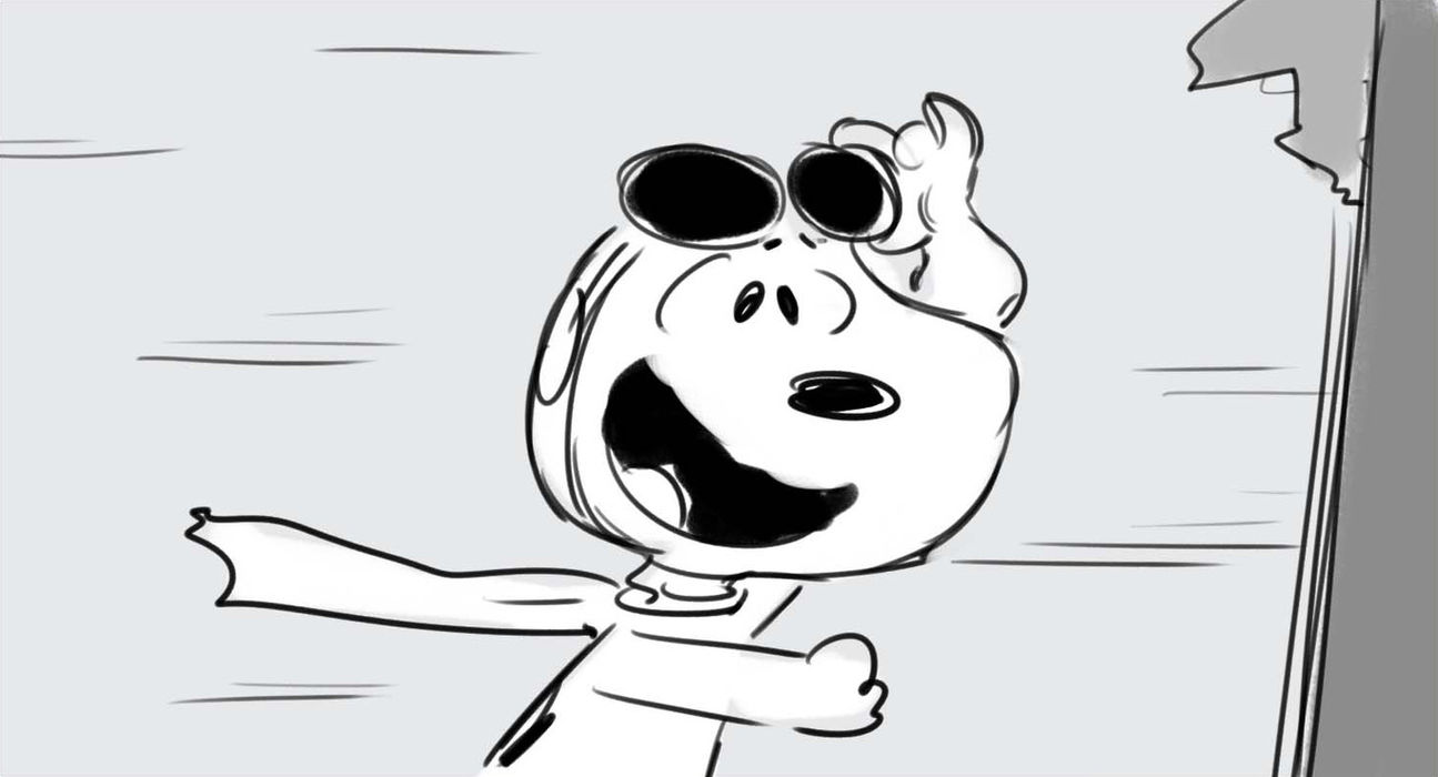 a white dog wearing a scarf and goggles